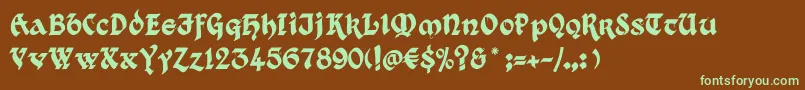 フォントKingthings Xander – 緑色の文字が茶色の背景にあります。