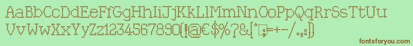 Czcionka Kingthings Xstitch – brązowe czcionki na zielonym tle