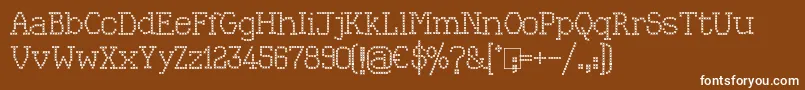 フォントKingthings Xstitch – 茶色の背景に白い文字