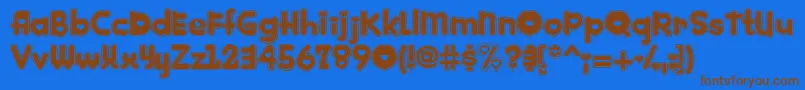 フォントKINKEE   – 茶色の文字が青い背景にあります。