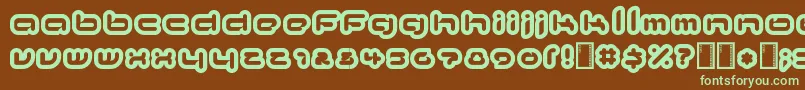 フォントkinkimono – 緑色の文字が茶色の背景にあります。