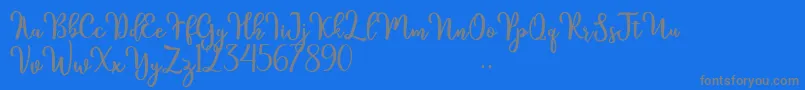 kinsley-Schriftart – Graue Schriften auf blauem Hintergrund