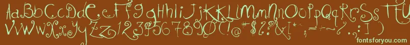 KISSMKMK Font – Green Fonts on Brown Background