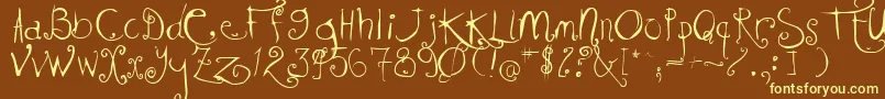 KISSMKMK Font – Yellow Fonts on Brown Background