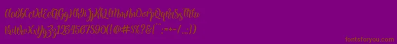 Kite Script Font – Brown Fonts on Purple Background
