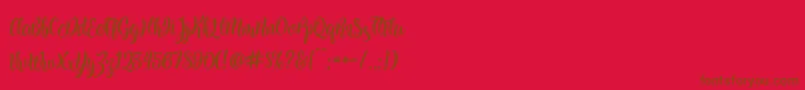 Kite Script Font – Brown Fonts on Red Background