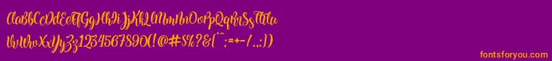 Fonte Kite Script – fontes laranjas em um fundo violeta