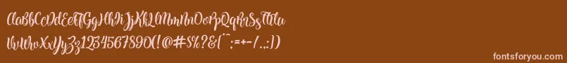 Kite Script Font – Pink Fonts on Brown Background