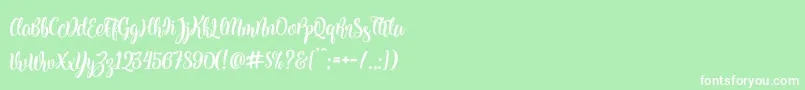 フォントKite Script – 緑の背景に白い文字