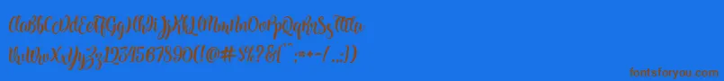 Kite Script-Schriftart – Braune Schriften auf blauem Hintergrund