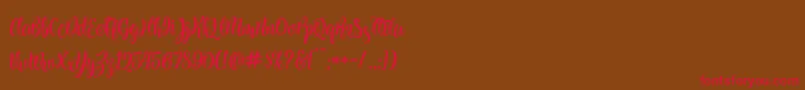 Шрифт Kite Script – красные шрифты на коричневом фоне