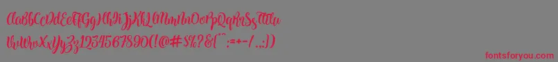 Kite Script Font – Red Fonts on Gray Background