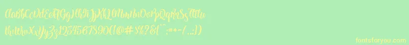 Kite Script Font – Yellow Fonts on Green Background