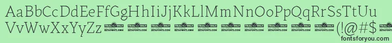 Шрифт Kitsch Text Extralight trial – чёрные шрифты на зелёном фоне