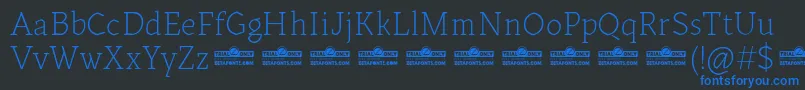 Шрифт Kitsch Text Extralight trial – синие шрифты на чёрном фоне