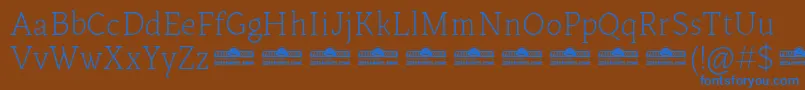 Czcionka Kitsch Text Extralight trial – niebieskie czcionki na brązowym tle