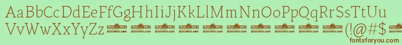 Kitsch Text Extralight trial Font – Brown Fonts on Green Background