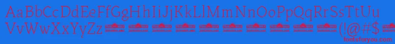 Kitsch Text Extralight trial Font – Red Fonts on Blue Background