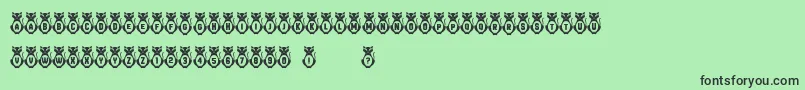 Kitties Font – Black Fonts on Green Background