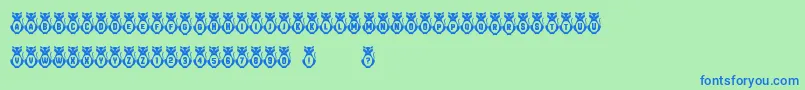 Kitties Font – Blue Fonts on Green Background