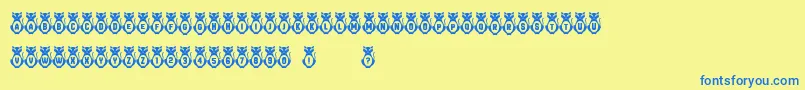 Kitties Font – Blue Fonts on Yellow Background