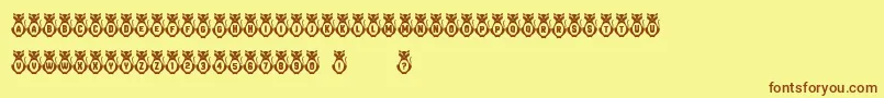 Kitties Font – Brown Fonts on Yellow Background