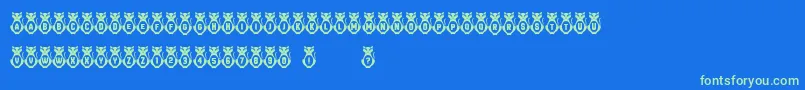 Kitties Font – Green Fonts on Blue Background