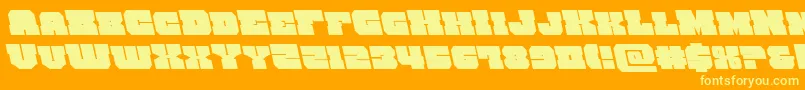 kittrickleft-Schriftart – Gelbe Schriften auf orangefarbenem Hintergrund