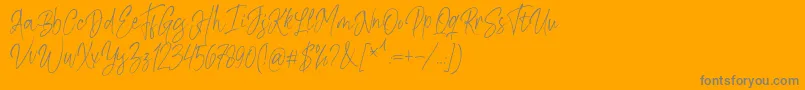 Kiysoom Demo-Schriftart – Graue Schriften auf orangefarbenem Hintergrund