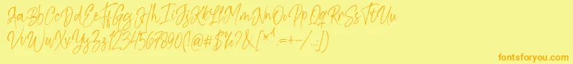 Шрифт Kiysoom Demo – оранжевые шрифты на жёлтом фоне