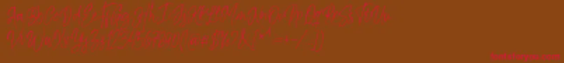 Шрифт Kiysoom Demo – красные шрифты на коричневом фоне