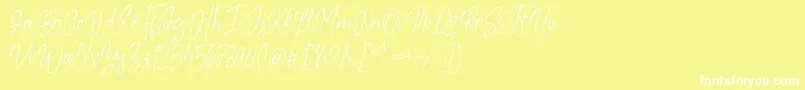Шрифт Kiysoom Demo – белые шрифты на жёлтом фоне