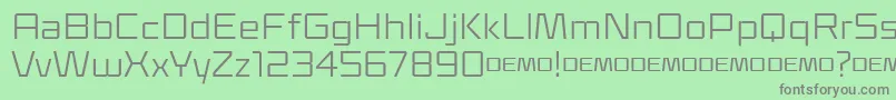 Klapt Regular-Schriftart – Graue Schriften auf grünem Hintergrund