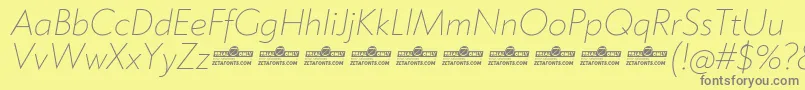 Fonte Klein ExtraLight Italic trial – fontes cinzas em um fundo amarelo