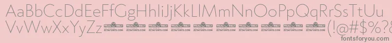 Klein ExtraLight trial-Schriftart – Graue Schriften auf rosa Hintergrund
