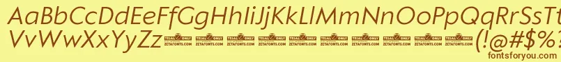 Шрифт Klein Text Book Italic trial – коричневые шрифты на жёлтом фоне