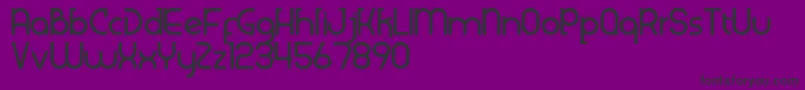 Fonte Klenik – fontes pretas em um fundo violeta
