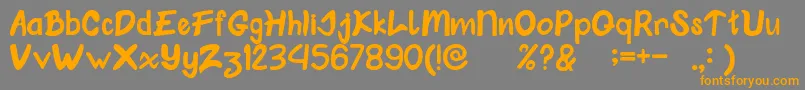 Klungkung-Schriftart – Orangefarbene Schriften auf grauem Hintergrund