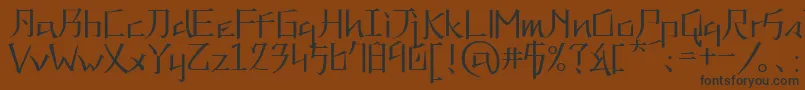 フォントkna   – 黒い文字が茶色の背景にあります