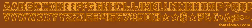 フォントknievel – オレンジ色の文字が茶色の背景にあります。