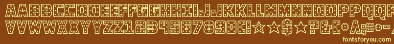 knievel-fontti – keltaiset fontit ruskealla taustalla