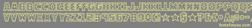 knievel-fontti – keltaiset fontit harmaalla taustalla
