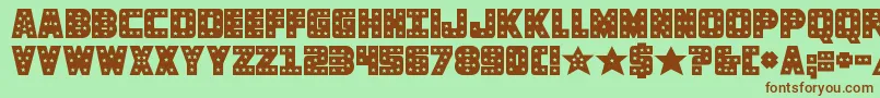 knievelsolid-fontti – ruskeat fontit vihreällä taustalla