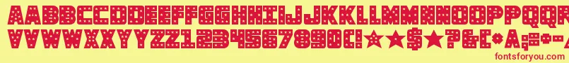 knievelsolid-Schriftart – Rote Schriften auf gelbem Hintergrund