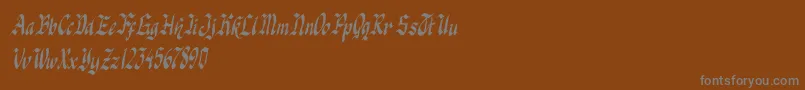 knight jacker italic-Schriftart – Graue Schriften auf braunem Hintergrund