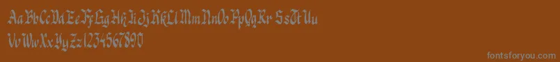 Knight Jacker Font – Gray Fonts on Brown Background