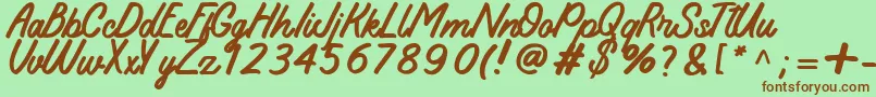 Koeltoerals Font – Brown Fonts on Green Background