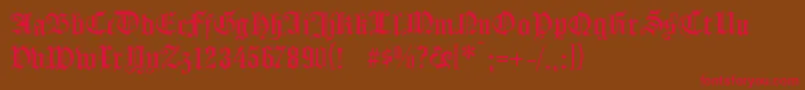 フォントKOENG    – 赤い文字が茶色の背景にあります。