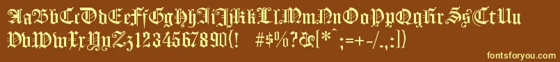 KOENG   -fontti – keltaiset fontit ruskealla taustalla