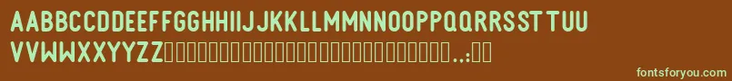 KOHNE MAKINA-fontti – vihreät fontit ruskealla taustalla